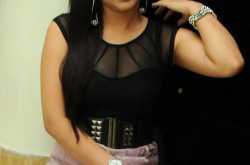 Aksha hot cleavage and creamy thigh show in a transparent black tops in a recent photoshoot images