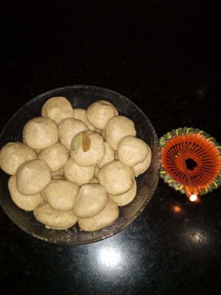 Atta Ladoo Recipe, Adding Crushed Almonds And Muskmelon Seeds.