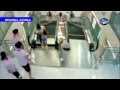 Mother Crushed By Escalator But Throws Son To Safety | CHINA