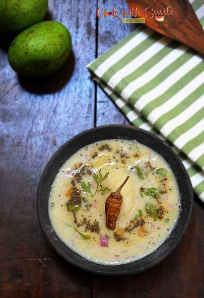 NEERU MAVINAKAYI MOSARU GOJJU / BRINED RAW MANGO RAITA - Cook With Smile